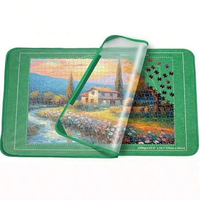 Celemela 1000片可折叠拼图垫，防滑表面，便携设计，适合居家、办公和旅行使用。绿色清新设计，经久耐用，易于收纳，是拼图爱好者的实用配件。托盘颜色随机。