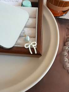 蝴蝶结心形手机挂饰 - 防尘塞手机配件，多种甜美颜色可选 - 彩色 - 查看 3