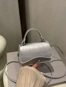 新款上市：休闲简约的翻盖手提包/单肩包，配有可调节肩带。适合青少年和旅行者，可轻松收纳日常必需品。这款百搭单品时尚百搭，适合各种风格和场合。它不仅风格百变，也是馈赠亲友的绝佳礼物。 - 經典手提包 - 查看 7