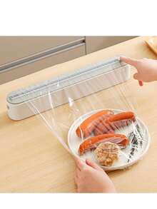 双功能保鲜膜分配器兼切割器 – 多功能厨房密封器，适用于塑料、锡箔纸、烘焙纸和蜡纸 – 可重复使用的包装机，橙色点缀 – 时尚黑白设计，厨房包装工具 | 时尚家电设计 | 耐用塑料结构 - 彩色 - 查看 8