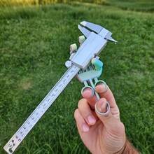 3D Printed Overdesigned Mechanical Stress Relief Hand Control This Hand By Pulling The Ring, And You'll Be Amazed At How Strong Its Grip Is! Grabbing Any Household Item (Or Even A Person) Is Endlessly Fun - Multicolor - View 4