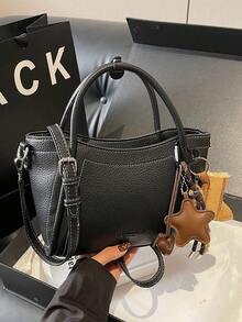 This New Fashionable And Versatile High-Quality Handbag Is Made Of PU Leather With A Textured Lychee Pattern, Quilted Design, And A Square Shape. It Features Dual Handles And An Adjustable Long Shoulder Strap, Allowing You To Carry It By Hand, On The Shoulder, Or Cross-Body. The Bag Is Decorated With A Textured Pattern And A Snow Boot Charm, Making It Suitable For Women's Daily Commute, Work, Dates, And Various Occasions.