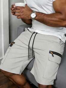 Pantalones cortos cargo para hombre de primavera-verano para exteriores con cintura elástica con cordón y bolsillos extragrandes con cremallera para senderismo, correr, trekking y uso diario - Gris Claro - Ver 1