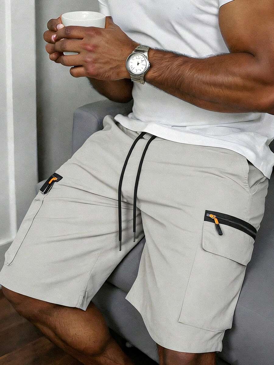 Pantalones cortos cargo para hombre de primavera-verano para exteriores con cintura elástica con cordón y bolsillos extragrandes con cremallera para senderismo, correr, trekking y uso diario - Gris Claro - Ver 1