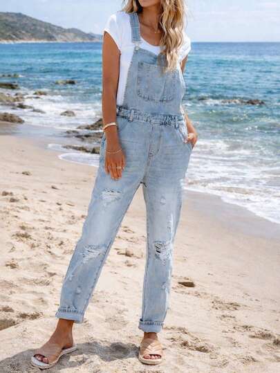 Bekväma, lösa ljusblå, randig denimbyxor och jumpsuit med kattmotiv för kvinnor