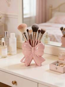 1 Stück süßer, schleifenförmiger Stifthalter - Organizer für Schreibtisch-Make-up-Pinsel und Büromaterial. Elegante Make-up-Pinsel-Aufbewahrungsbox, geeignet für Mädchen, Studenten und kreative Dekoration. Auch geeignet für Feiertage, Strand, Badezimmer, Schlafzimmer und mehr. Große Kapazität (ohne Strom erforderlich).