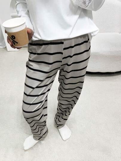 女士格子条纹印花七分睡裤，韩版男女通用款，舒适时尚，适合居家休闲穿着，春秋冬三季皆宜。