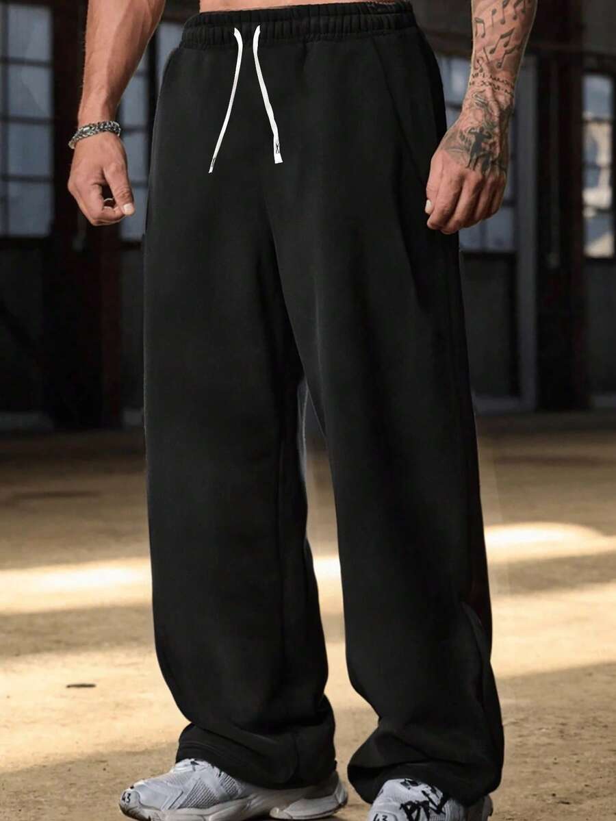 Celana Jogging Hitam Longgar Ukuran Besar untuk Pria, Desain Tali Serut, Nyaman & Serbaguna - Hitam - View 1