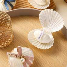 10个贝壳烛台，是婚礼、新娘送礼会和海滩派对的理想礼物。适合家居、房间和户外花园装饰，送给女士、母亲、朋友、女朋友和男朋友都很合适。也是生日、婚礼、周年纪念日、情人节、感恩节和新年等节日的完美礼物。