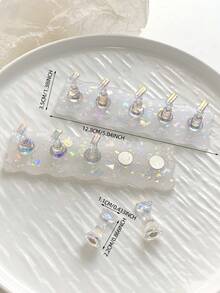 Set de decoración de uñas con base ovalada de resina acrílica en degradado de color, macaron dorado y bolas de cristal de acero multicolor. Herramientas y accesorios de arte de uñas minimalista de moda en estilo retro coreano con láser.