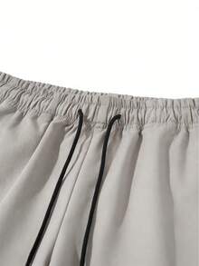 Pantalones cortos cargo para hombre de primavera-verano para exteriores con cintura elástica con cordón y bolsillos extragrandes con cremallera para senderismo, correr, trekking y uso diario - Gris Claro - Ver 6