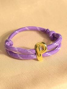MECYLIFE 1 pieza Pulsera trenzada hecha a mano con cuerda colorida de dopamina con 26 letras, adecuada para hombres y mujeres - Cuerda morada - Ver 5