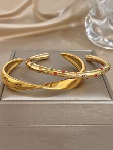 18K镀金不锈钢个性开口手镯套装，镶嵌彩色锆石，女士佩戴于手腕而非手臂，质感波西米亚风可叠戴手镯，适合情人节、派对、晚宴、日常佩戴、约会、狂欢节、新年、婚礼、海滩、圣诞节、周年纪念日等场合，也是送给妈妈的优雅礼物、波西米亚风珠宝、生日礼物或伴娘礼物的理想之选。 - 彩色 - 查看 4