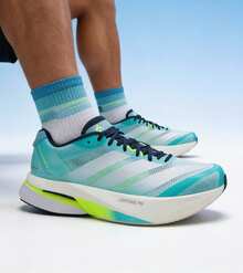 Adidas Zapatillas de running ADIZERO BOSTON 13 M, con tecnología de mediasuela Lightstrike Pro, amortiguación ligera y reactiva, zapatillas de running para hombre - Azul/Gris plateado/Amarillo limón - Ver 1