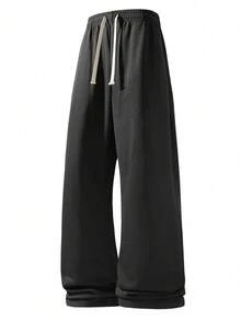 男士宽松休闲纯色阔腿裤，带抽绳腰带和大口袋，适合日常行走、工作、旅行和其他场合。