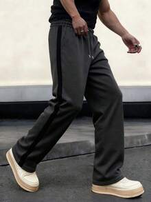 Calça de moletom masculina folgada, modelo reto e casual, ideal para o dia a dia, treinos esportivos, corrida, atividades ao ar livre, fitness, caminhada, streetwear, lazer e para o outono/inverno.