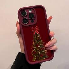 Funda para teléfono con lazo de árbol de Navidad. Esta elegante funda con efecto espejo presenta un festivo diseño de árbol de Navidad adornado con un vibrante lazo rojo. Es compatible con  17,  16 Pro Max,  15 Pro Max,  13 y  12. Fabricada con TPU resistente, garantiza protección contra golpes y caídas. Perfecta para regalar a familiares, amigos y seres queridos durante las fiestas, ideal para Navidad, cumpleaños o cualquier ocasión especial. - Burdeos - Ver 3