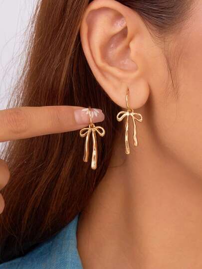 Pendientes elegantes y de moda con lazo y borlas, adecuados para uso diario, citas de vacaciones y otras ocasiones, también son un pequeño regalo sorprendente y exquisito.