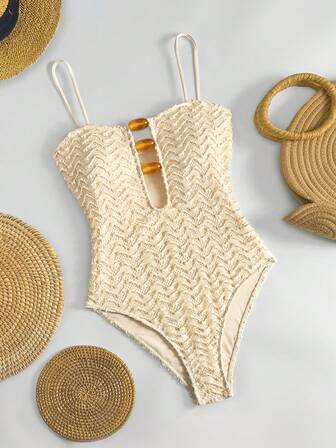 Traje de baño de una pieza elegante y bohemio para mujer con tirantes finos, detalles calados con cuentas y tela texturizada de alta elasticidad