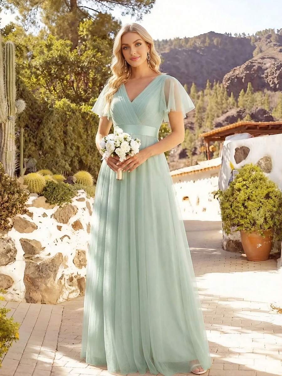 Đầm phù dâu thanh lịch màu xanh lá cây nhạt, cổ chữ V, dáng chữ A, chất liệu chiffon, thích hợp cho khách dự đám cưới, ngày Valentine, tiệc sinh nhật và các dịp trang trọng mùa xuân.