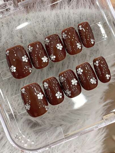 10pcs Pure Handmade Press On Nails Medium Nails Square Nails With A Rich Caramel Brown Base Color And Small Floral Patterns Composed Of Silver Sequins As Accents, The Delicate And Sweet Elements Are Combined, Neither Messy Nor Lacking In Detailed Highlights.Gentle Elegant Cute Nails For Ladies And Girls Spring Summer Fall Winter Festivals Parties And Daily Life Use