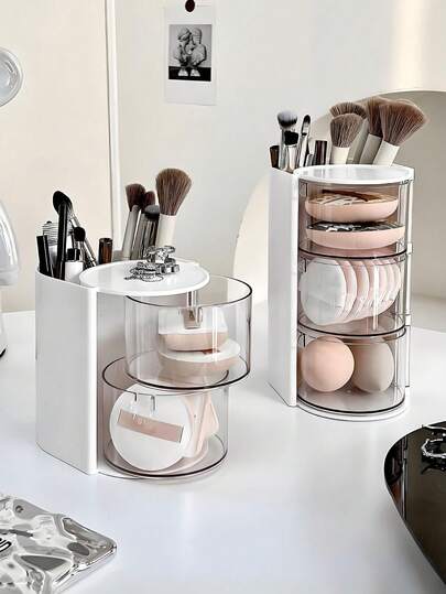 2/1 化妆台收纳盒 - 半透明多隔层化妆品收纳盒，一侧可旋转。节省空间的浴室桌面收纳盒，无需组装。适合收纳气垫粉饼、粉扑、化妆海绵、眉笔和化妆刷。是送给女性的完美生日/圣诞礼物。设计优雅，坚固耐用。