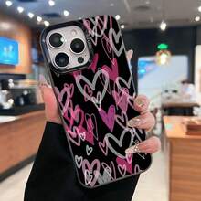 Fondo de corazones en rosa y gris sobre negro. Esta elegante funda es compatible con los modelos  17, 16, 15, 14 Pro Max, 13, 12, 11, XR y XS Plus. Fabricada en silicona TPU, ofrece protección contra golpes y caídas, además de una sensación superior. Es un regalo ideal para familiares, amigos y seres queridos, y una opción perfecta para Año Nuevo. - Negro - Ver 2