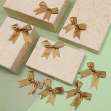 鲜艳的红色缎带蝴蝶结 - 优雅的圆形装饰，适用于礼品包装、手工制作、生日和婚礼装饰，采用涤纶材质，是节日礼物和礼品包装的理想之选。 - 彩色 - 查看 2