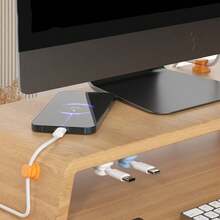1pc,Rotatable Cable Organizer That Can Rotate 360°. Available In Black, White, Orange And Blue, This Adhesive-Type Organizer Can Be Stuck To Desktops Or Walls For Cable Management.