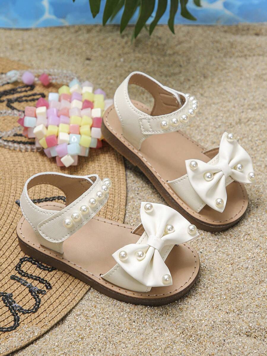 Girls' Fashionable Cute Flat Sandals, Elementary School PU Sandals With Bow & Pearl Decor, Outdoor/School Casual Sandals, Recommended For Holidays, Children/Kids Shoes/Kids Sandals/Kids Flat Sandals - Beige - View 1