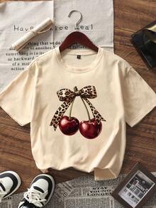 تي شيرت نسائي قصير الأكمام بياقة مستديرة، طباعة نمر وفراشة، طراز عصري وشامل مناسب للنساء - مشمش فاتح - مشاهدة 2