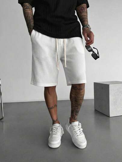 1 pieza Pantalones cortos de hombre con cintura de cordón y contraste de color blanco, textura de gofre, tela de punto transpirable, pantalones cortos casuales sueltos y cómodos, adecuados para uso diario, en casa y para ir y venir