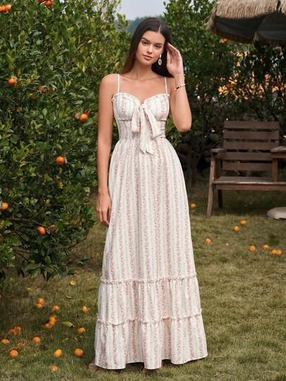 PARTHEA Vestido largo elegante y bohemio para mujer sin mangas con tirantes finos, espalda descubierta, fruncido, bajo acampanado con detalle de nudo, tela sin estiramiento, casual y lindo con estampado maxi