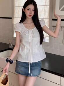 Áo sơ mi nữ tay phồng buộc dây, cài một hàng khuy, dáng ôm, mỏng nhẹ, thích hợp mặc mùa hè, xuân, màu trắng. - trắng - Xem 3