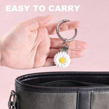 Tragbare Reise-Mützenklammer - kann an Handtaschen, Rucksäcken, Reisegepäck und Outdoor-Sonnenhüten befestigt werden, auch geeignet für Outdoor-Strohhüte. Ein unverzichtbares Reiseaccessoire und ein perfektes Urlaubsgeschenk oder Präsent. - Verschiedenfarbig - Übersicht 8