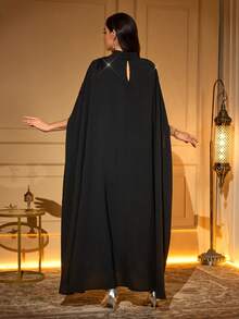 Elegant Black Long Abaya, Batwing Half Sleeve, Stand Collar, Woven Fabric With Delicate Floral Applique - Black - View 2
