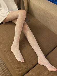 Unleash Your Inner Fashionista With Our White Lace Bowknot Mesh Socks! Say Goodbye To The Fragile Stereotypes Of Fishnets! These Socks Are Where Sweet Romance Meets Cutting-Edge Resilience. They Are Not Just An Accessory; They Are A Year-Round Style Staple. Imagine The Softness Of Premium Fibers Against Your Skin-Light As A Feather And Incredibly Breathable.