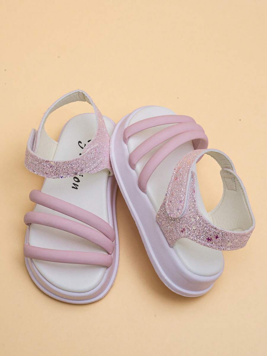 Cute & Cool Kids' Glitter Star Sandals, Suitable For Girls Aged 4-8 Years Old. Thick & Soft Soles With Anti-Slip Particles. Elastic Ankle Strap For Easy On/Off. Soft & Comfortable Upper, Pairs Well With Dresses And Jeans. Perfect For Parties And Photo Shoots. - Pink - View 1