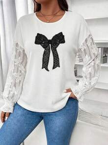 Camiseta de talla grande con cuello redondo, mangas dolman, parches de encaje y lazo con lentejuelas