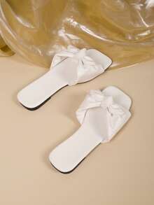 Dép xăng đan đế bằng nữ kiểu dáng giản dị, có nơ trang trí, đế thấp thoải mái, thích hợp cho kỳ nghỉ và đi biển. - trắng - Xem 7