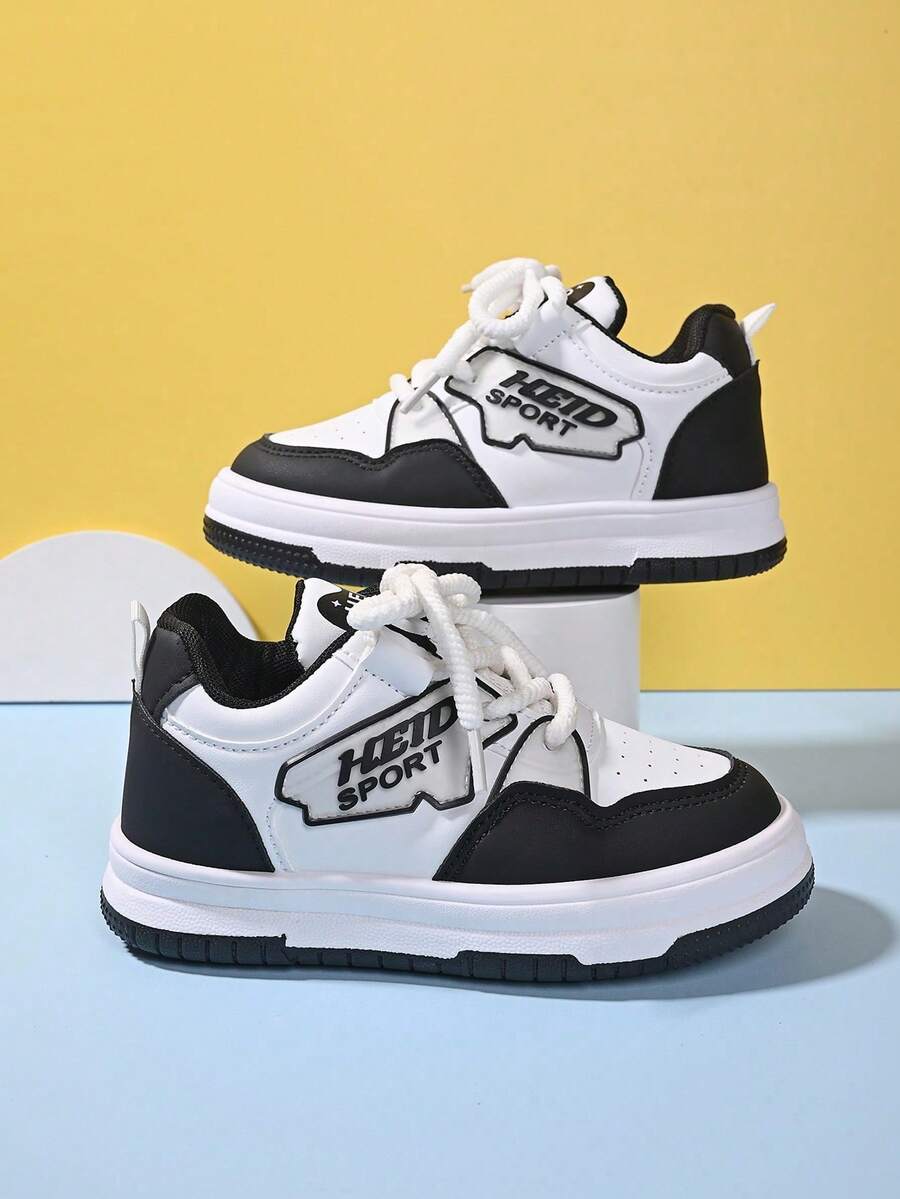 "Toddler Kids Sport Sneakers – Classic Black & White Design, Breathable Perforated Upper, Chunky Rope Laces, Non-Slip Thick Sole Casual Daily Footwear" - Black and White - View 1