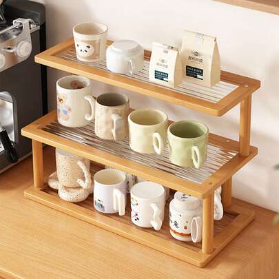 1 chiếc kệ bếp 3 tầng bằng tre, đa chức năng, dùng làm giá để cốc và kệ trà, kệ đựng đồ ăn, kệ đựng gia vị dung tích lớn, kệ đựng dụng cụ nhà bếp, kệ đựng máy pha cà phê và hạt cà phê, giá để chai, có 2 kiểu dáng, thoáng khí và chống ẩm, thích hợp cho nhà bếp, phòng ăn, quầy cà phê, phòng khách để trưng bày và cất giữ đồ dùng.