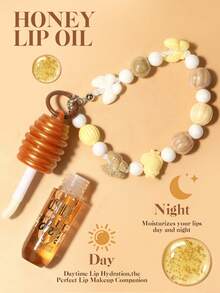 USHAS Honey Nourishing Moisturizing Lip Oil, Creative Pendant Design For Hanging On Bags Or Phones, Deep Moisturization And Hydration, Non-Sticky Formula, Day And Night Nourishing Care, Fashionable Makeup Accessory For Holidays, Creates Plump, Dewy Lips