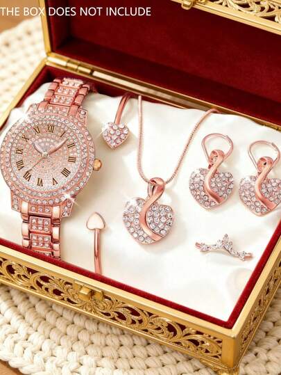 6件套奢华优雅女士石英表套装，搭配玫瑰金首饰。套装包含：1块石英表，表盘镶嵌全水晶水钻罗马数字，配金属表带；1条心形水晶手链；1条项链；1副耳环；以及1枚戒指，主要颜色为玫瑰金。