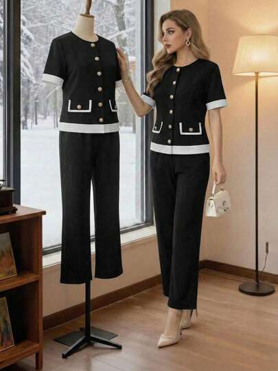 Bộ đồ nữ 2 món gồm áo sơ mi ngắn tay cổ chữ V phối màu tương phản và quần dài kiểu dáng thường ngày, thích hợp cho mùa tựu trường, đi làm thanh lịch, nữ tính cho mùa xuân/hè.