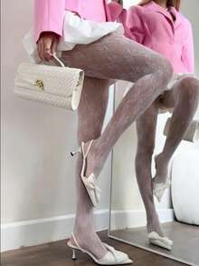 Unleash Your Inner Fashionista With Our White Lace Bowknot Mesh Socks! Say Goodbye To The Fragile Stereotypes Of Fishnets! These Socks Are Where Sweet Romance Meets Cutting-Edge Resilience. They Are Not Just An Accessory; They Are A Year-Round Style Staple. Imagine The Softness Of Premium Fibers Against Your Skin-Light As A Feather And Incredibly Breathable.