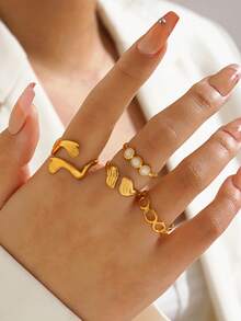 4件套不锈钢18K镀金几何椭圆翅膀拥抱戒指套装，适合女性日常及派对佩戴