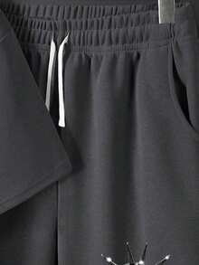 Bộ áo thun ngắn tay cổ tròn in hình hoạt hình dành cho bé trai và quần short. - Màu xám đen - Xem 5
