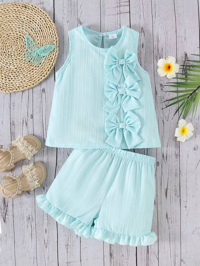 2件套女童纯色清新质感蝴蝶结装饰无袖水滴领背心+纯色可爱荷叶边短裤套装，夏季