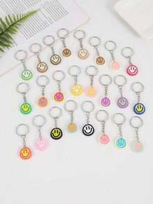 Chaveiros com 14/18/21/24/27/30/40 unidades de carinhas sorridentes e fofas de desenho animado, ideais para lembrancinhas de festa, presentes de Natal e volta às aulas (cor aleatória). - Multicolorido - Ver 4